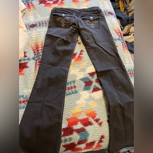 Black bootcut rock n roll jeans by Wrangler